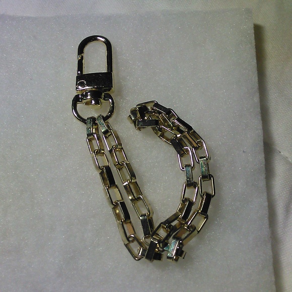 COPY - LOUIS VUITTON KEY FOB / JUST REMOVED PLASTIC LIKE NEW UNUSED GOLD/ BLACK… - Picture 13 of 13